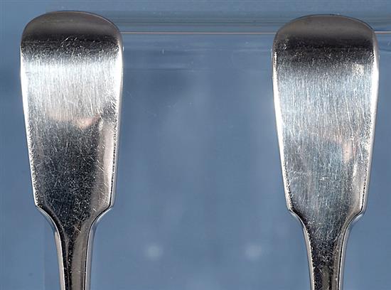 A pair of William IV silver fiddle pattern serving spoons and a similar Victorian pair, Length 237mm, weight 4.9oz/153grms